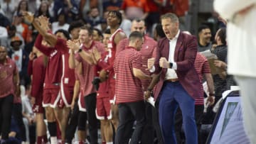 AUBURN, ALABAMA - FEBRUARY 11: Head coach Nate Oats of the Alabama Crimson Tide reacts to a big play during the second half of their game against the Auburn Tigers at Neville Arena on February 11, 2023 in Auburn, Alabama. (Photo by Michael Chang/Getty Images)