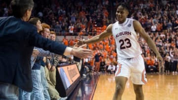 Auburn forward Isaac Okoro (23) high five fans at Auburn Arena in Auburn, Ala., on Wednesday, Jan. 8, 2020. Auburn defeated Vanderbilt 83-79.Jc Auburnvandy 31