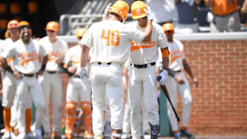 Tennessee’s Luc Lipcius (40) celebrates a home run with his teammate during a game between Tennessee and Georgia at Lindsey Nelson Stadium in Knoxville, Tenn. on Saturday, May 14, 2022. Georgia defeated Tennessee 8-3.Tennesseegeorgia0514 0387