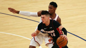 Miami Heat guard Tyler Herro (14) drives to the net against New York Knicks guard RJ Barrett (9) at Madison Square Garden.(Mike Stobe/POOL PHOTOS-USA TODAY Sports)