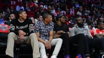 Feb 16, 2013; Houston, TX, USA; From left, New Orleans Hornets forward Anthony Davis, and Western Conference guard Russell Westbrook of the Oklahoma City Thunder, and Western Conference forward Kevin Durant of the Oklahoma City Thunder, and Western Conference guard James Harden of the Houston Rockets watch the 2013 NBA All-Star three-point contest at the Toyota Center. Mandatory Credit: Bob Donnan-USA TODAY Sports