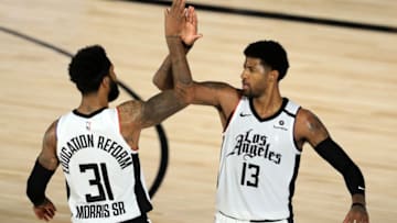 LA Clippers, Paul George, Marcus Morris (Photo by Michael Reaves/Getty Images)