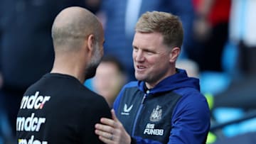 MANCHESTER, ENGLAND - MAY 08: Pep Guardiola, Manager of Manchester City, shakes hands with Eddie Howe, Manager of Newcastle United, prior to kick off of the Premier League match between Manchester City and Newcastle United at Etihad Stadium on May 08, 2022 in Manchester, England. (Photo by Alex Livesey/Getty Images)