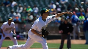 Jul 17, 2016; Oakland, CA, USA; Oakland Athletics starting pitcher Rich Hill (18) pitches the ball against the Toronto Blue Jays during the first inning at O.co Coliseum. Mandatory Credit: Kelley L Cox-USA TODAY Sports