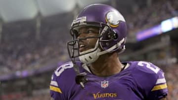 Dec 1, 2013; Minneapolis, MN, USA; Minnesota Vikings running back Adrian Peterson (28) looks on during overtime against the Chicago Bears at Mall of America Field at H.H.H. Metrodome. The Vikings defeated the Bears 23-20 in overtime. Mandatory Credit: Brace Hemmelgarn-USA TODAY Sports