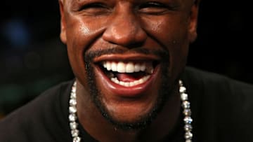 WASHINGTON, DC - APRIL 01: Floyd Mayweather looks on after Adrien Broner and Ashley Theophane fought at the DC Armory on April 1, 2016 in Washington, DC. (Photo by Patrick Smith/Getty Images)