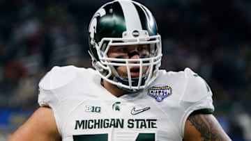ARLINGTON, TX - DECEMBER 31: Offensive tackle Jack Conklin #74 of the Michigan State Spartans looks on before taking on the Alabama Crimson Tide during the Goodyear Cotton Bowl at AT&T Stadium on December 31, 2015 in Arlington, Texas. (Photo by Scott Halleran/Getty Images)