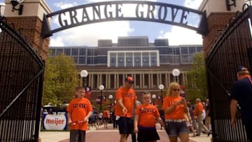 Sep 3, 2016; Champaign, IL, USA; Football fans wearing shirts with a message honoring new Illinois Fighting Illini head coach Lovie Smith enjoy activities in Grange Grove before the game between the Illinois Fighting Illini and the Murray State Racers at Memorial Stadium. Mandatory Credit: Mike Granse-USA TODAY Sports