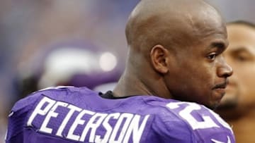 Oct 13, 2013; Minneapolis, MN, USA; Minnesota Vikings running back Adrian Peterson (28) walks along the sideline late in the game with the Carolina Panthers at Mall of America Field at H.H.H. Metrodome. Panthers win 35-10. Mandatory Credit: Bruce Kluckhohn-USA TODAY Sports