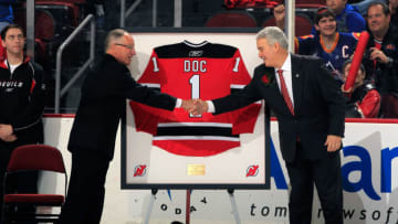 NEWARK, NJ - FEBRUARY 24: Mike 'Doc' Emerick meets owner and managing partner Jeff Vanderbeek of the New Jersey Devils during pregame ceremonies honoring 'Doc' Emerick night prior to the start of the game against the New Jersey Devils and Vancouver Canucks at the Prudential Center on February 24, 2012 in Newark, New Jersey. (Photo by Chris Trotman/Getty Images)