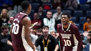 Mississippi State guard Shawn Jones Jr. (30) celebrates scoring a basket against Florida with guard Dashawn Davis (10) during overtime in a second round SEC Men’s Basketball Tournament game at Bridgestone Arena in Nashville, Tenn., Thursday, March 9, 2023.Fla Ms G3 030923 An 038