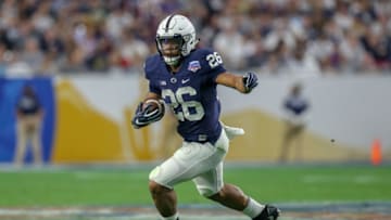 GLENDALE, AZ - DECEMBER 30: Saquon Barkley (26) of the Penn State Nittany Lions runs for a gain in the Fiesta Bowl game between the Washington Huskies and the Penn State Nittany Lions on December 30, 2017 at the University of Phoenix Stadium in Glendale, AZ. (Photo by Jordon Kelly/Icon Sportswire via Getty Images)
