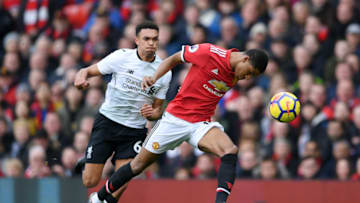 MANCHESTER, ENGLAND - MARCH 10: Marcus Rashford of Manchester United beats Alexander-Arnold Trent of Liverpool on his way to scoring the opening goal during the Premier League match between Manchester United and Liverpool at Old Trafford on March 10, 2018 in Manchester, England. (Photo by Laurence Griffiths/Getty Images)