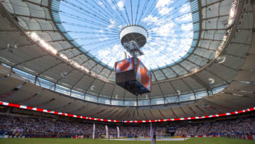 VANCOUVER, BC - AUGUST 23: Vancouver Whitecaps and Seattle Sounders stand on the field under an open roof during the national anthems prior to their match at BC Place on August 23, 2017 in Vancouver, Canada. (Photo by Derek Cain/Icon Sportswire via Getty Images)