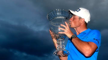 RIO GRANDE, PUERTO RICO - FEBRUARY 23: Viktor Hovland of Norway poses with the trophy on the 18th green after winning the Puerto Rico Open at Grand Reserve Country Club on February 23, 2020 in Rio Grande, Puerto Rico. (Photo by Jared C. Tilton/Getty Images)