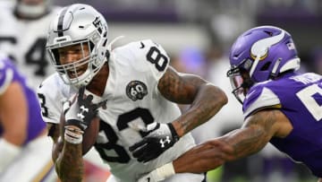 MINNEAPOLIS, MINNESOTA - SEPTEMBER 22: Darren Waller #83 of the Oakland Raiders runs the ball against Eric Wilson #50 of the Minnesota Vikings during the fourth quarter of the game at U.S. Bank Stadium on September 22, 2019 in Minneapolis, Minnesota. The Vikings defeated the Raiders 34-14. (Photo by Hannah Foslien/Getty Images)