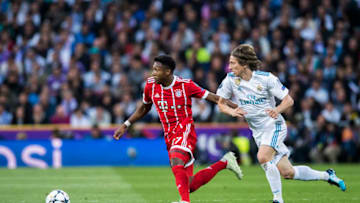MADRID, SPAIN - MAY 01: David Alaba (L) of FC Bayern Munich is tackled by Luka Modric of Real Madrid during the UEFA Champions League Semi Final Second Leg match between Real Madrid and Bayern Muenchen at the Bernabeu on May 1, 2018 in Madrid, Spain. (Photo by Power Sport Images/Getty Images)