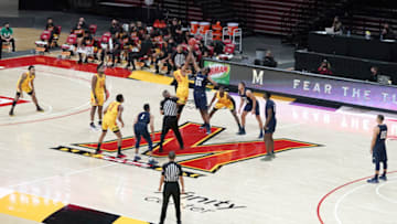 COLLEGE PARK, MD - NOVEMBER 27: Tip off between the the Maryland Terrapins and the Navy Midshipmen during a college basketball game on November 27, 2020 at the Xfinity Center in College Park, Maryland. (Photo by Mitchell Layton/Getty Images)