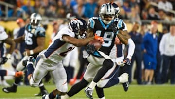 Feb 7, 2016; Santa Clara, CA, USA; Carolina Panthers wide receiver Ted Ginn (19) runs the ball as Denver Broncos cornerback Aqib Talib (21) defends during the third quarter in Super Bowl 50 at Levi