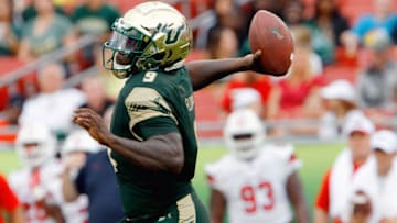 TAMPA, FL - SEPTEMBER 2: Quarterback Quinton Flowers #9 of the South Florida Bulls prepares to throw the ball to a receiver during their game against the Stony Brook Sea Wolves at Raymond James Stadium on September 2, 2017 in Tampa, Florida. (Photo by Joseph Garnett Jr. /Getty Images)