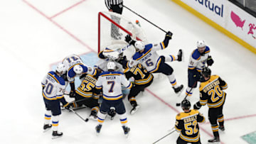 BOSTON, MASSACHUSETTS - MAY 29: Charlie McAvoy #73 of the Boston Bruins and Joel Edmundson #6 of the St. Louis Blues get tangled up during the second period in Game Two of the 2019 NHL Stanley Cup Final at TD Garden on May 29, 2019 in Boston, Massachusetts. (Photo by Patrick Smith/Getty Images)