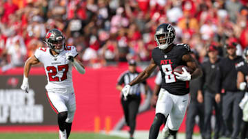 Oct 22, 2023; Tampa, Florida, USA; Atlanta Falcons tight end Kyle Pitts (8) is chased out of bounds by Tampa Bay Buccaneers cornerback Zyon McCollum (27) in the fourth quarter at Raymond James Stadium. Mandatory Credit: Nathan Ray Seebeck-USA TODAY Sports