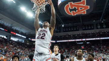 Auburn basketball guard Allen Flanigan (22) warms up with his team as Auburn Tigers men's basketball faces South Carolina Gamecocks at Neville Arena in Auburn, Ala., on Saturday, March 5, 2022.