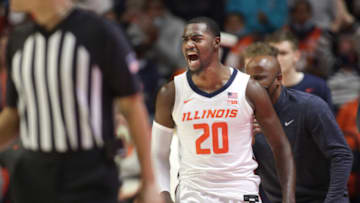 Nov 26, 2021; Champaign, Illinois, USA; Illinois Fighting Illini guard Da'Monte Williams (20) reacts off the bench during the second half against the Texas-Rio Grande Valley Vaqueros at State Farm Center. Mandatory Credit: Ron Johnson-USA TODAY Sports