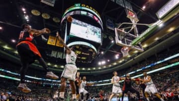 Apr 14, 2015; Boston, MA, USA; Toronto Raptors forward Terrence Ross (31) shoots against Boston Celtics forward Brandon Bass (30) in the first half at TD Garden. Mandatory Credit: David Butler II-USA TODAY Sports