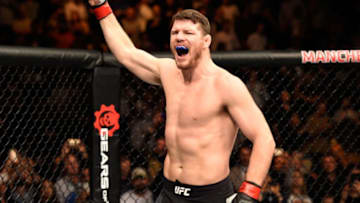 MANCHESTER, ENGLAND - OCTOBER 08: Michael Bisping of England enters the Octagon before facing Dan Henderson in their UFC middleweight championship bout during the UFC 204 Fight Night at the Manchester Evening News Arena on October 8, 2016 in Manchester, England. (Photo by Josh Hedges/Zuffa LLC/Zuffa LLC via Getty Images)