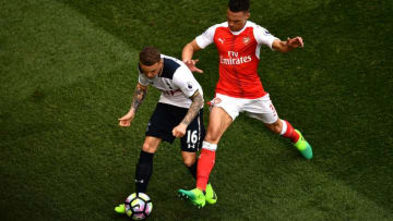 LONDON, ENGLAND - APRIL 30: Kieran Trippier of Tottenham Hotspur and Kieran Gibbs of Arsenal battle for possession during the Premier League match between Tottenham Hotspur and Arsenal at White Hart Lane on April 30, 2017 in London, England. (Photo by Dan Mullan/Getty Images)