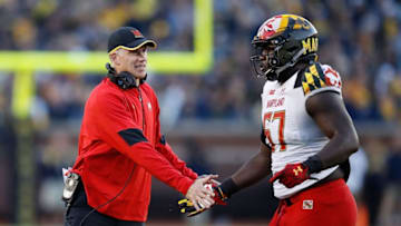 ANN ARBOR, MI - NOVEMBER 05: Head coach D.J. Durkin of the Maryland Terrapins celebrates a made field goal with Richard Merritt