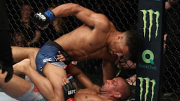ATLANTIC CITY, NJ - APRIL 21: (L-R) Kevin Lee punches Edson Barboza of Brazil in their lightweight fight during the UFC Fight Night event at the Boardwalk Hall on April 21, 2018 in Atlantic City, New Jersey. (Photo by Patrick Smith/Zuffa LLC/Zuffa LLC via Getty Images)