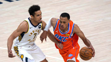 OKC Thunder forward Darius Bazley (right) dribbles the ball against Pacers guard Malcolm Brogdon: Trevor Ruszkowski-USA TODAY Sports