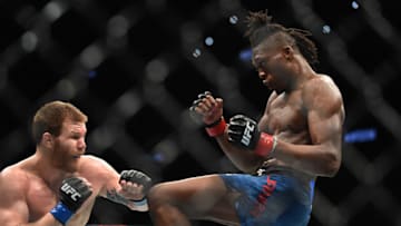 ATLANTA, GEORGIA - APRIL 13: Jalin Turner looks to knee Matt Frevola during the UFC 236 event at State Farm Arena on April 13, 2019 in Atlanta, Georgia. (Photo by Logan Riely/Getty Images)
