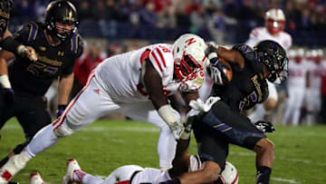 Oct 18, 2014; Evanston, IL, USA; Northwestern Wildcats wide receiver Miles Shuler (5) tries to get past Nebraska Cornhuskers defensive tackle Vincent Valentine (98) during the first half at Ryan Field. Mandatory Credit: Caylor Arnold-USA TODAY Sports
