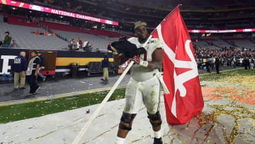 Jan 11, 2016; Glendale, AZ, USA; Alabama Crimson Tide offensive lineman Alphonse Taylor (50) celebrates after beating the Clemson Tigers in the 2016 CFP National Championship at University of Phoenix Stadium. Mandatory Credit: Matt Kartozian-USA TODAY Sports