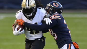 CHICAGO, ILLINOIS - NOVEMBER 01: Alvin Kamara #41 of the New Orleans Saints runs the ball against Eddie Jackson #39 of the Chicago Bears in the first quarter at Soldier Field on November 01, 2020 in Chicago, Illinois. (Photo by Quinn Harris/Getty Images)