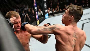 GDANSK, POLAND - OCTOBER 21: (R-L) Darren Till of England punches Donald Cerrone in their welterweight bout during the UFC Fight Night event inside Ergo Arena on October 21, 2017 in Gdansk, Poland. (Photo by Jeff Bottari/Zuffa LLC/Zuffa LLC via Getty Images)