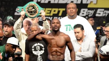Sep 12, 2014; Las Vegas, NV, USA; Floyd Mayweather on the scale during the the weigh-in for his WBC Superwelter weight title fight against Marcos Maidana (not pictured) at the MGM Grand Garden Arena. Mandatory Credit: Jayne Kamin-Oncea-USA TODAY Sports