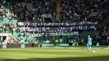 GLASGOW, SCOTLAND - AUGUST 17: Celtic fans dispaly banners during the Betfred League Cup match between Celtic and Dunfermline Athletic at Celtic Park on August 17, 2019 in Glasgow, Scotland. (Photo by Ian MacNicol/Getty Images)