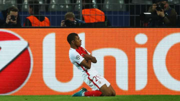 DORTMUND, GERMANY - APRIL 12: Kylian Mbappe of AS Monaco celebrates after scoring his team's third goal of the game during the UEFA Champions League Quarter Final first leg match between Borussia Dortmund and AS Monaco at Signal Iduna Park on April 12, 2017 in Dortmund, Germany. The match was rescheduled after an alleged terrorist attack on the Borussia Dortmund team coach as it made it's way to the stadium. (Photo by Dean Mouhtaropoulos/Bongarts/Getty Images)