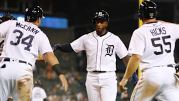 DETROIT, MI - MAY 14: Niko Goodrum #28 of the Detroit Tigers celebrates his eighth inning three run home run with John Hicks #55 and James McCann #34 while playing the Cleveland Indians at Comerica Park on May 14, 2018 in Detroit, Michigan. (Photo by Gregory Shamus/Getty Images)