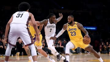 LOS ANGELES, CALIFORNIA - MARCH 10: LeBron James #23 of the Los Angeles Lakers drives to the basket on Taurean Prince #2 of the Brooklyn Nets and Jarrett Allen #31 during a 104-102 Nets win at Staples Center on March 10, 2020 in Los Angeles, California. (Photo by Harry How/Getty Images) NOTE TO USER: User expressly acknowledges and agrees that, by downloading and or using this photograph, User is consenting to the terms and conditions of the Getty Images License Agreement.
