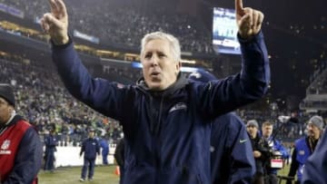 January 10, 2015; Seattle, WA, USA; Seattle Seahawks head coach Pete Carroll celebrates the 31-17 victory against the Carolina Panthers following the second half in the 2014 NFC Divisional playoff football game at CenturyLink Field. Mandatory Credit: Joe Nicholson-USA TODAY Sports