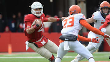LINCOLN, NE - NOVEMBER 10: Quarterback Adrian Martinez #2 of the Nebraska Cornhuskers attempts to escape the tackle of defensive back Ron Hardge III #23 of the Illinois Fighting Illini in the first half at Memorial Stadium on November 10, 2018 in Lincoln, Nebraska. (Photo by Steven Branscombe/Getty Images)