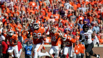 CLEMSON, SC - NOVEMBER 03: Tavien Feaster #28 of the Clemson Tigers runs for a touchdown against the Louisville Cardinals during their game at Clemson Memorial Stadium on November 3, 2018 in Clemson, South Carolina. (Photo by Streeter Lecka/Getty Images)