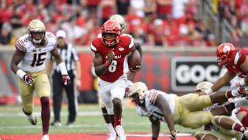 Sep 17, 2016; Louisville, KY, USA; Louisville Cardinals quarterback Lamar Jackson (8) runs the ball against the Florida State Seminoles during the second half at Papa John