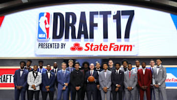 NEW YORK, NY - JUNE 22: Potential first round draft picks Front Row (L-R) - OG Anunoby, Dennis Smith, Malik Monk, Luke Kennard, Lonzo Ball, Markelle Fultz, De'aaron Fox, Frank Ntilikina, Justin Jackson, Back Row (L-R) Bam Adebayo, Jonathan Isaac, Justin Patton, Lauri Markkanen, Jayson Tatum, Josh Jackson, Zach Collins, Donovan Mitchell and TJ Leaf pose with NBA commissioner Adam Silver on stage before the first round of the 2017 NBA Draft at Barclays Center on June 22, 2017 in New York City. NOTE TO USER: User expressly acknowledges and agrees that, by downloading and or using this photograph, User is consenting to the terms and conditions of the Getty Images License Agreement. (Photo by Mike Stobe/Getty Images)