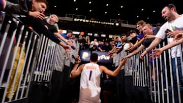 PHOENIX, AZ - MARCH 4: Devin Booker #1 of the Phoenix Suns runs through the tunnel after the game against the Milwaukee Bucks on March 4, 2019 at Talking Stick Resort Arena in Phoenix, Arizona. NOTE TO USER: User expressly acknowledges and agrees that, by downloading and or using this photograph, user is consenting to the terms and conditions of the Getty Images License Agreement. Mandatory Copyright Notice: Copyright 2019 NBAE (Photo by Barry Gossage/NBAE via Getty Images)